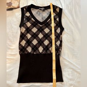 Cropped vneck sweater vest.